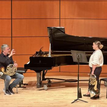 Richard Deane (left) giving instruction during his Horn Workshop master class.