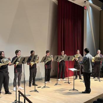  James Naigus (right) conducts the UGA Horn Choir during a performance at the SEHW in Edge Hall.