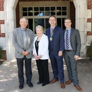 Daniel Ellis with his parents Phil and Judy Ellis (left) and partner, Shaun Baer, director of public relations for the Hugh Hodgson School of Music